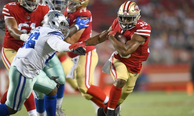 SANTA CLARA, CA - AUGUST 09:  Tarvarus McFadden #33 of the San Francisco 49ers carries the ball aga...