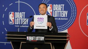 SECAUCUS, NJ - AUGUST 20: Deputy Commissioner of the NBA, Mark Tatum holds up the card of the Sacramento Kings after they get the 12th overall pick in the NBA Draft during the 2020 NBA Draft Lottery on August 20, 2020 at the NBA Entertainment Studios in Secaucus, New Jersey. NOTE TO USER: User expressly acknowledges and agrees that, by downloading and/or using this photograph, user is consenting to the terms and conditions of the Getty Images License Agreement. Mandatory Copyright Notice: Copyright 2020 NBAE (Photo by Steven Freeman/NBAE via Getty Images)