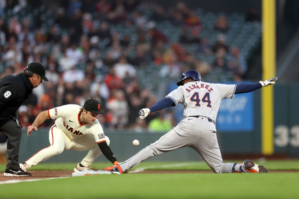 SAN FRANCISCO, CALIFORNIA - JUNE 10: Yordan Alvarez #44 of the Houston Astros slides safely into th...