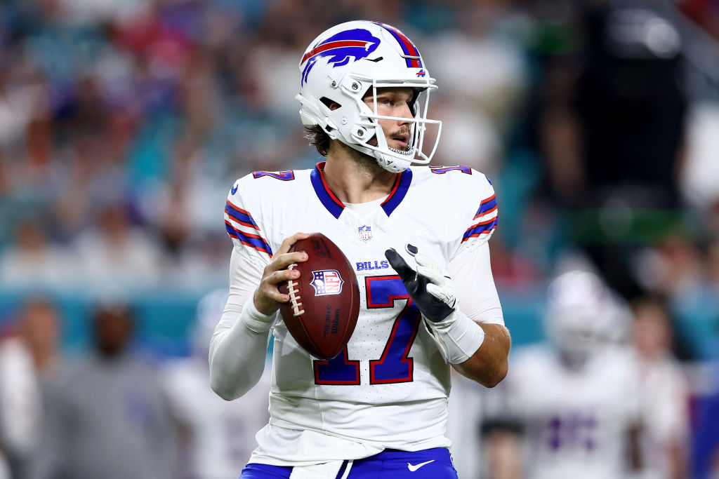 MIAMI GARDENS, FLORIDA - SEPTEMBER 12: Josh Allen #17 of the Buffalo Bills looks to throw a pass ag...